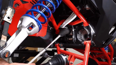 Braden inserts the new Rhino 2.0 axle into the differential.
