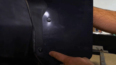 Braden points out the two push pins you should remove and reuse.