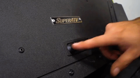 Press a button and the trunk bed enclosure opens right up!
