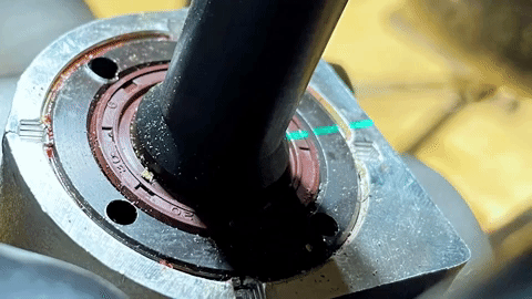 A vivid green line next to the steering shaft.