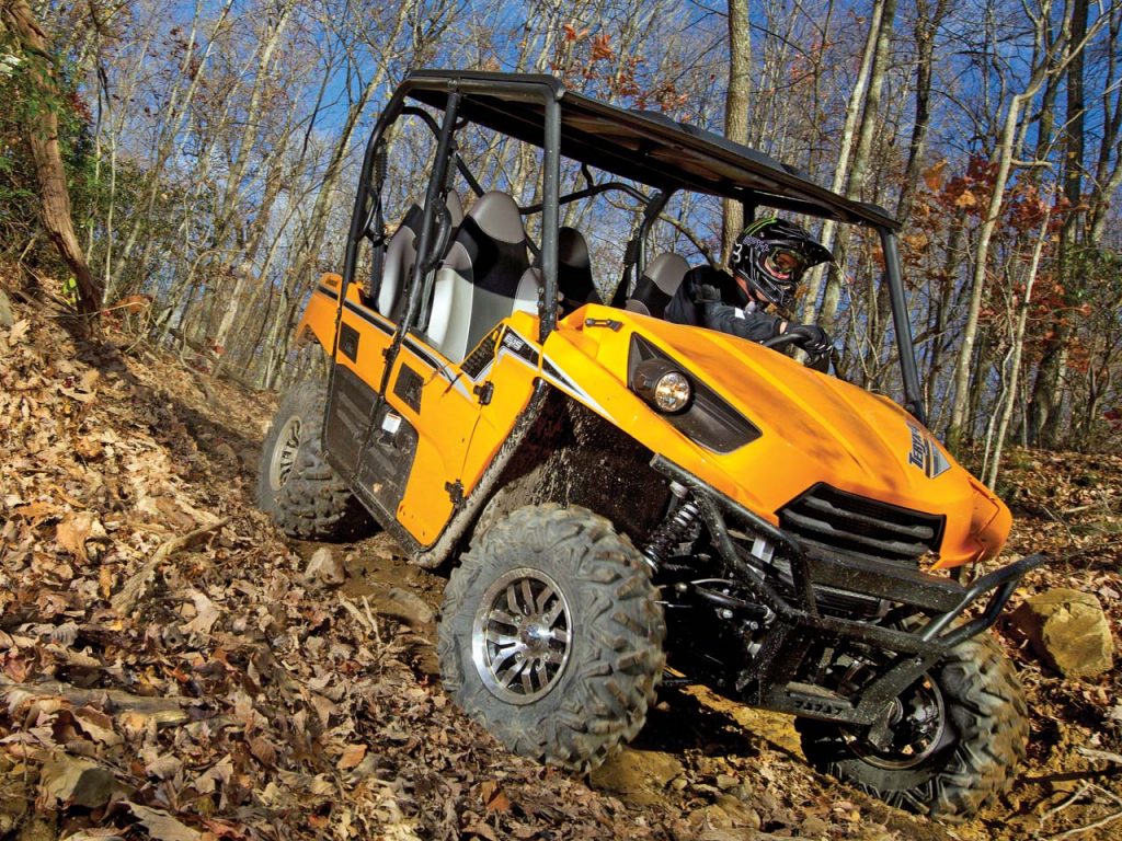 Kawasaki Teryx 4 riding in woods