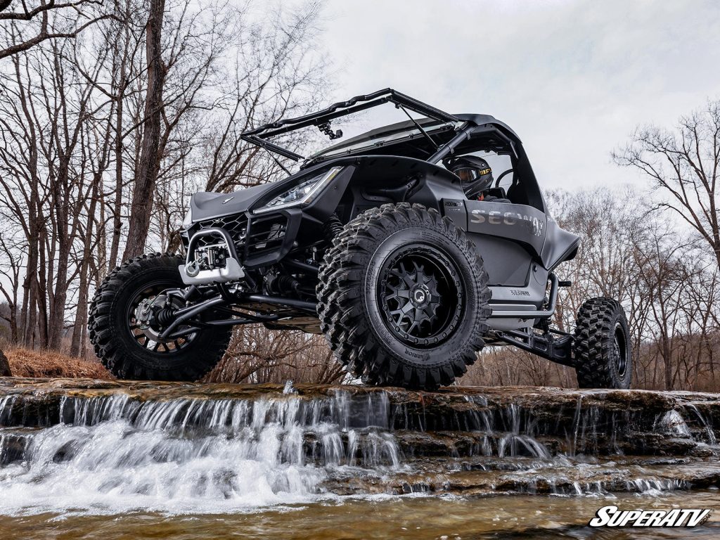 A Segway Villian parked in a rocky creek.