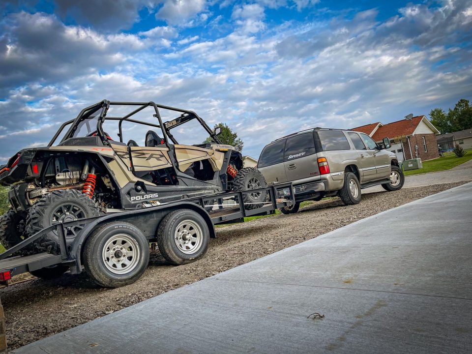 Van hauling a new RZR XP 1000 home