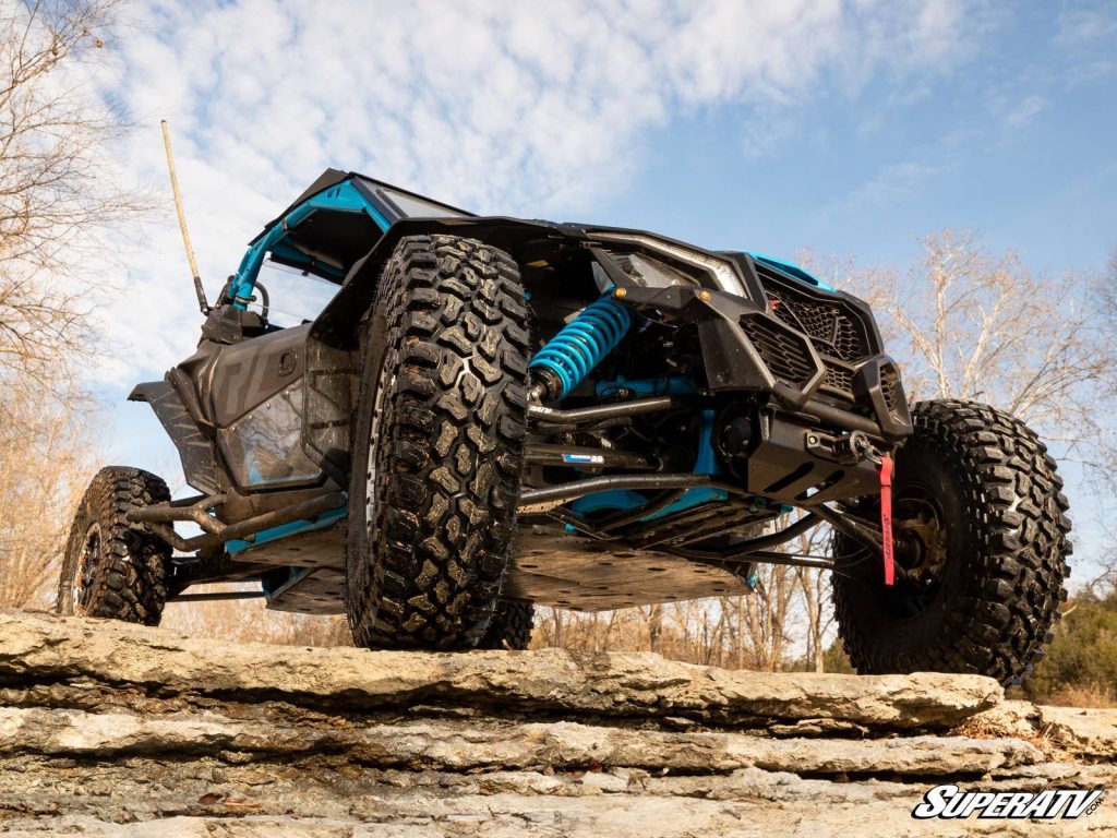 A Can-Am Maverick with giant SuperATV axles installed.