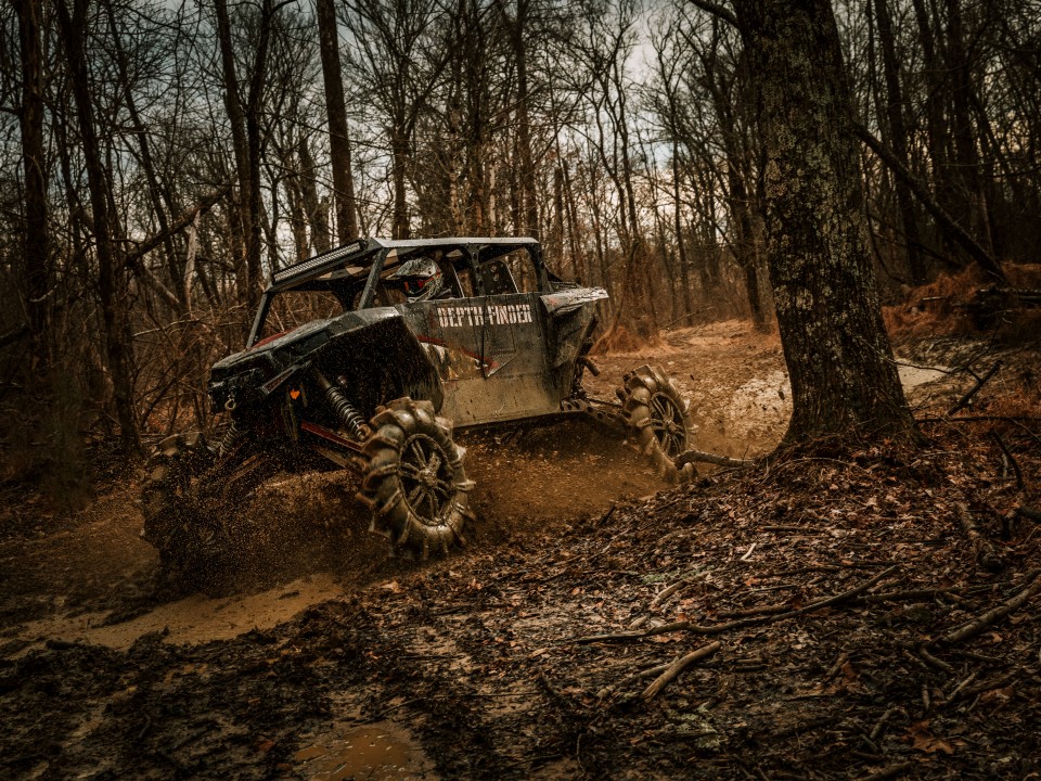 SuperATV Depth Finder mudding in woods