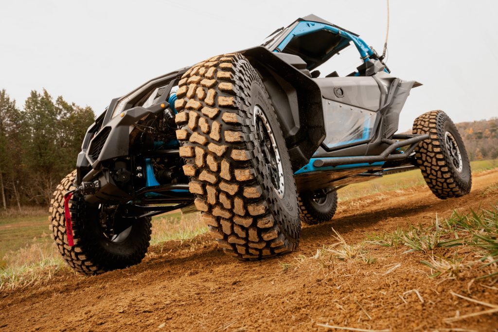 UTV shot from below, focusing on the tires.