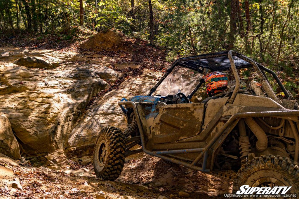 Polaris RZR XP 1000 climbing dirt trail