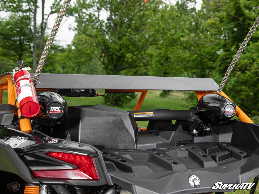 A rear view of a Can-Am Maverick with MTX speakers installed.