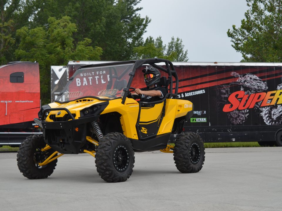 Can-Am Commander in front of SuperATV trailer