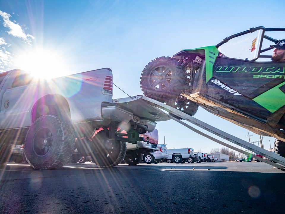 Arctic Cat Wildcat being loaded into truck bed