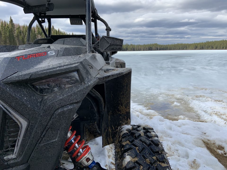 I Polaris RZR XP Turbo S by a frozen lake.