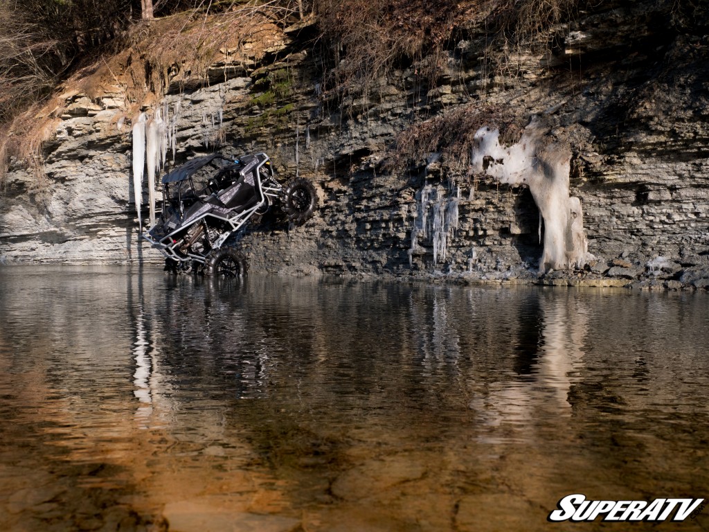Polaris RZR XP Turbo riding in creek bed