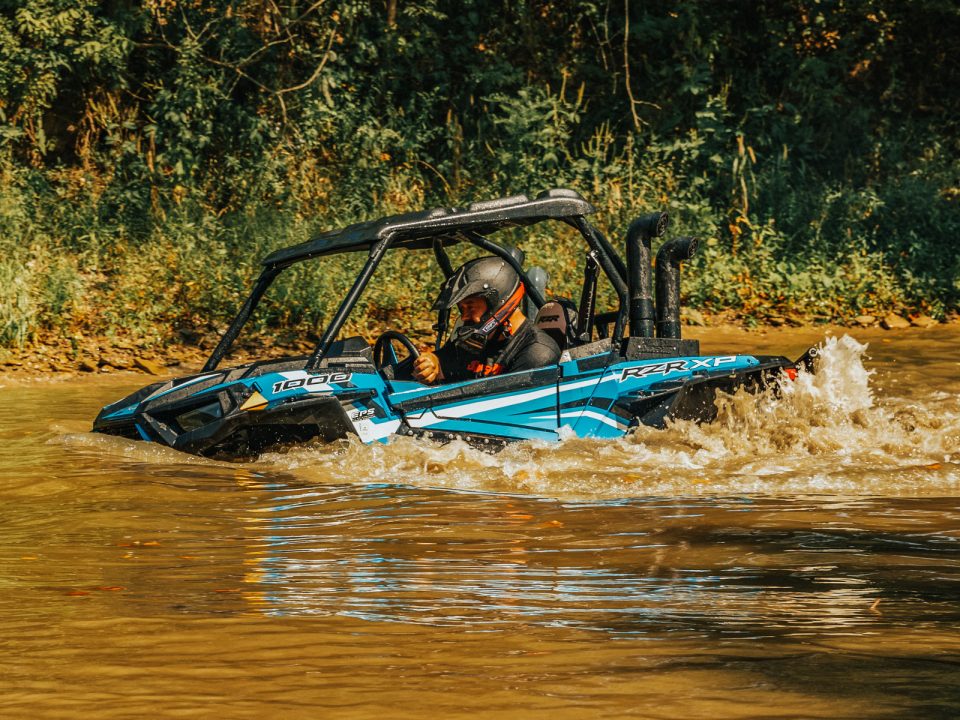 Polaris RZR XP 1000 with snorkel kit deep in creek