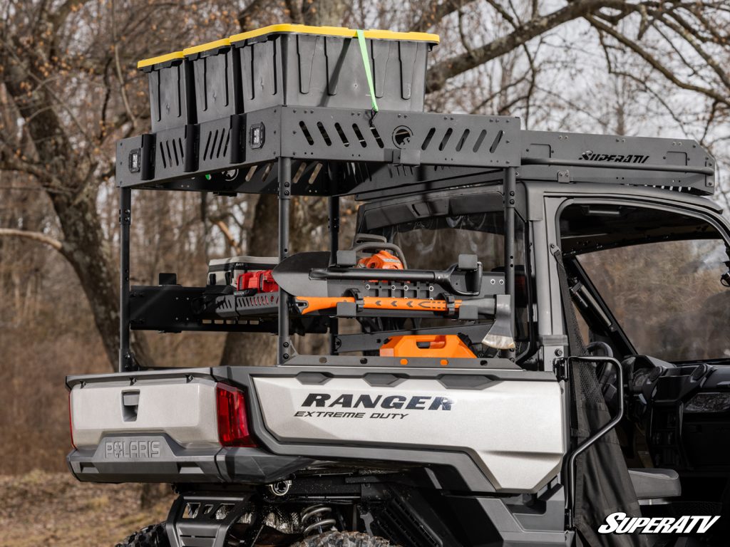 A Polaris Ranger with an Outfitter bed rack and roof rack installed.
