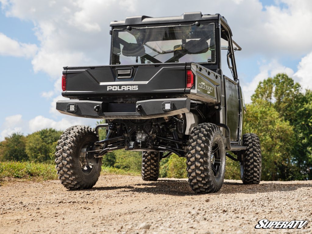 A Polaris Ranger with a Portal Gear Lift viewed from the back.