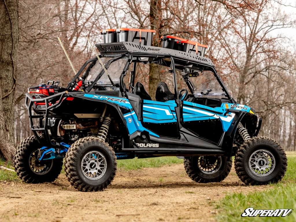A Polaris RZR XP with an Outfitter Roof Rack installed.