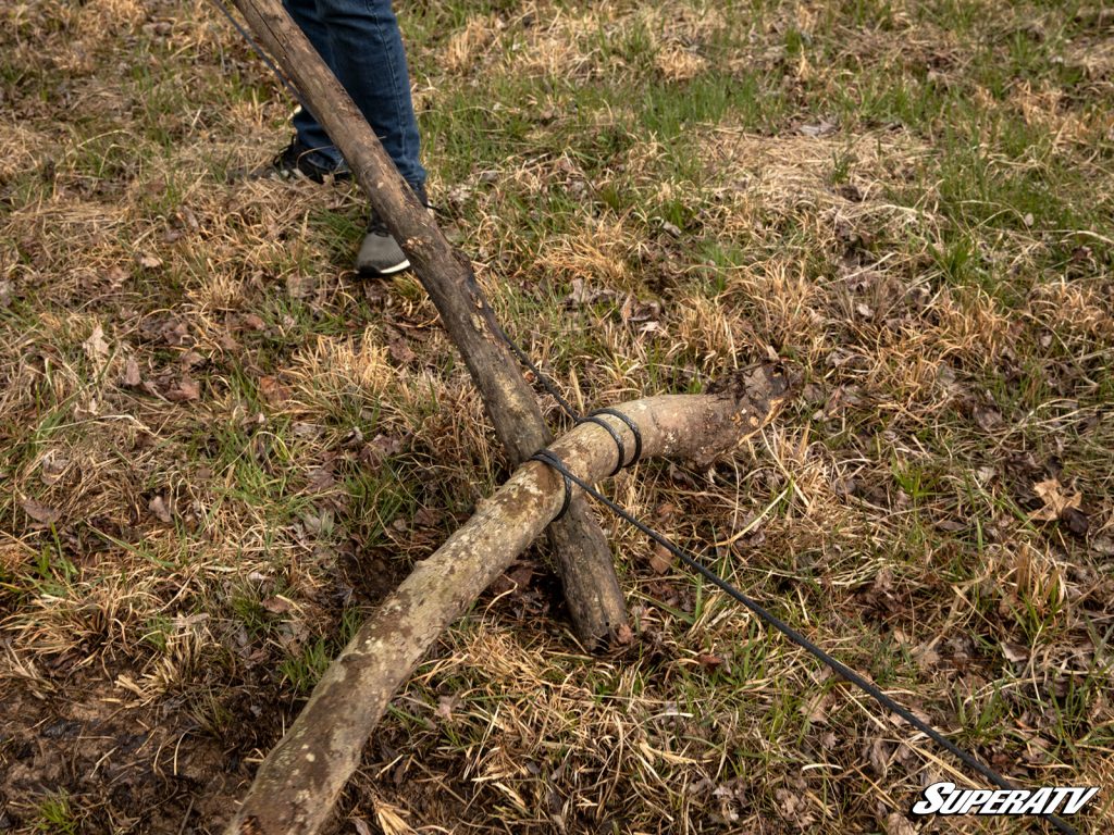 Winch tied around broken tree