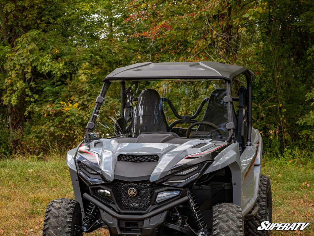 A Yamaha Wolverine with a SuperATV windshield.