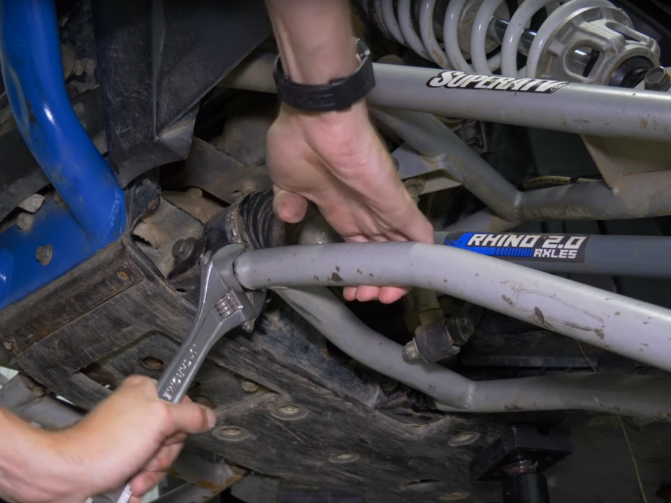 SuperATV grey tubed A-arm install