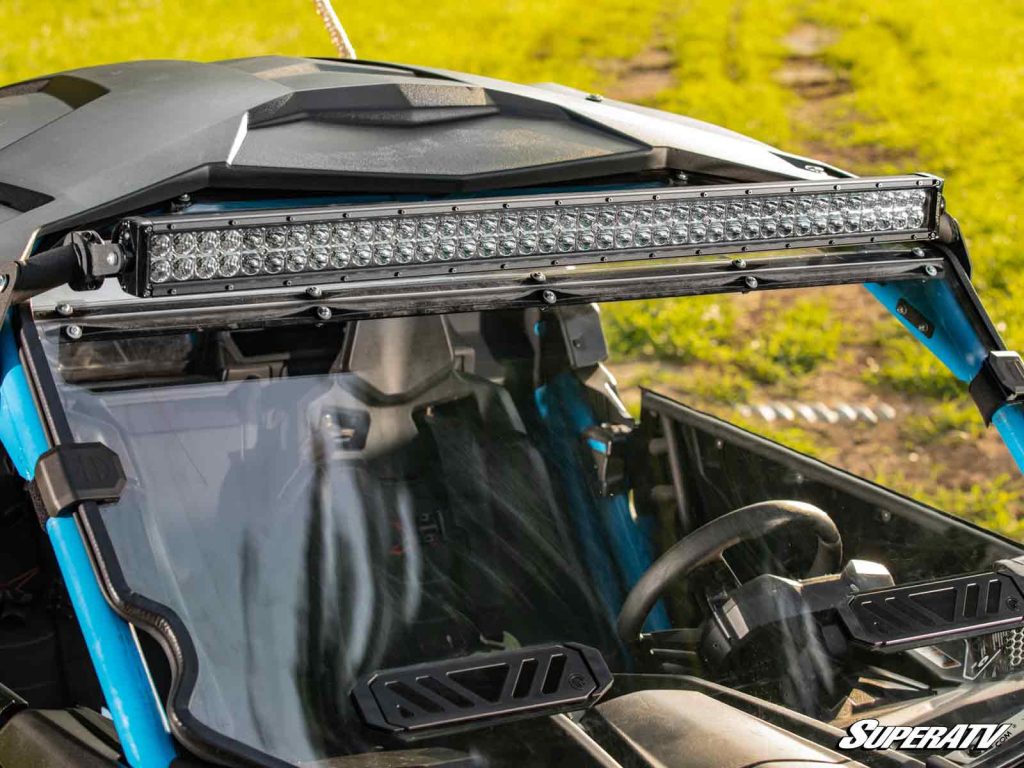 A long lightbar installed on a UTV's roof.