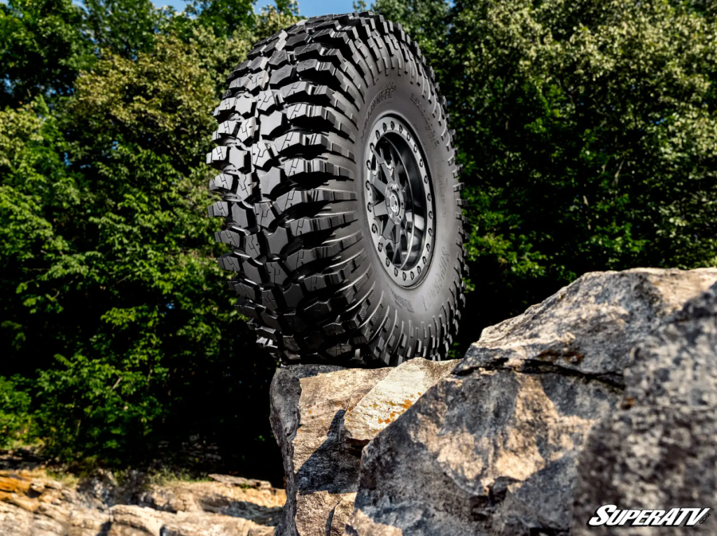 A Cliffhanger tire on a rock.