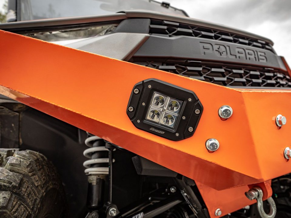 Recessed cube light installed on a front bumper