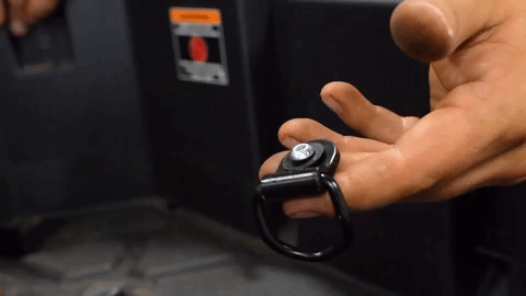 Brandon reinstalls the factory D-ring to the hole.