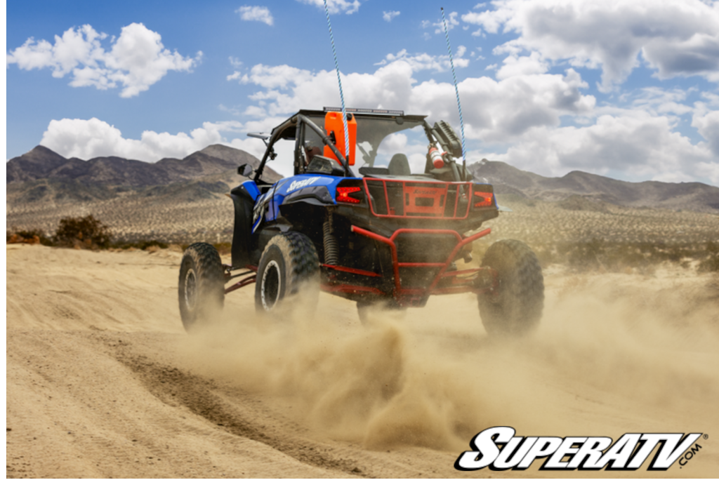 A UTV riding through the desert.