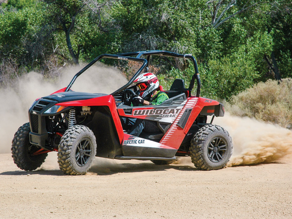 Arctic Cat Wildcat kicking up dust