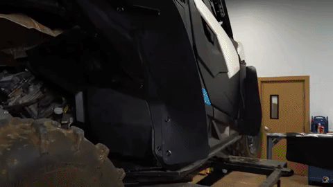 The SuperATV logo flashes and glitches ins a stylized way over an image of the fully installed fender flares.