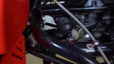 The SuperATV logo flashes and glitches over an image of SuperATV's RackBoss 2.0 Rack and Pinion fully installed on a Polaris RZR Pro XP.