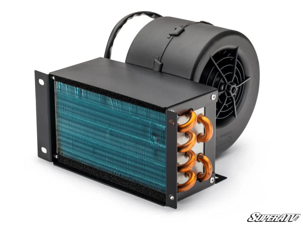 An in-dash cab heater with the heater core showing.