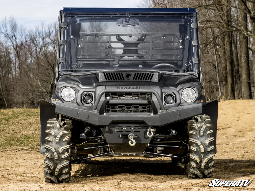 A Kawasaki Mule with a SuperATV windshield and Fender flares