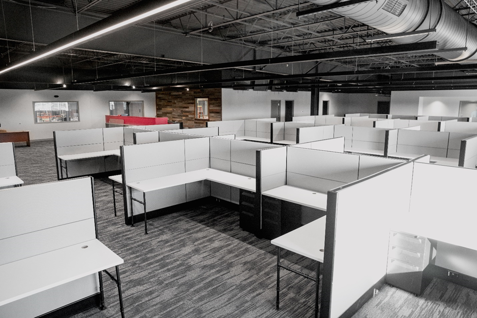 Brand-new cubicles almost glow under bright indoor lights.