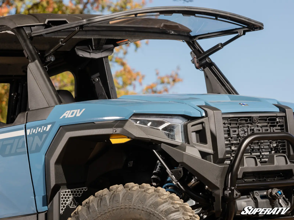 A SuperATV Flip Windshield installed on a Polaris Xpedition.