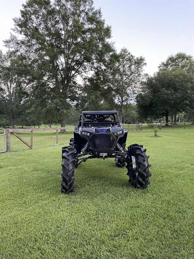 A RZR 1000 with 8" GDP Portals and massive tires