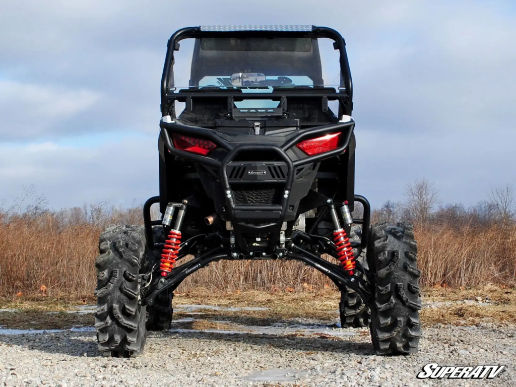 A big SuperATV lift kit showing the profile of the suspension underneath the UTV