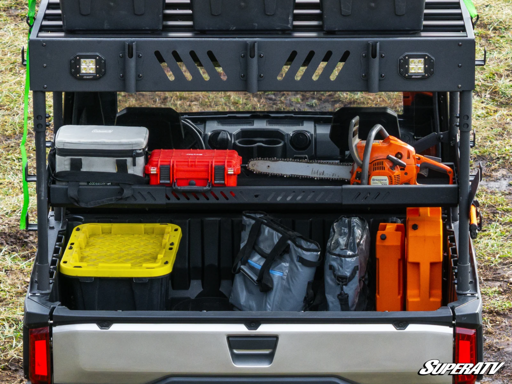 An outfitter bed rack stocked with gear on a Ranger XD 1500
