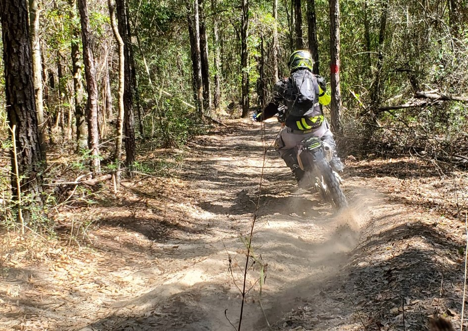 A dirt bike on a trail in Clear Creek Riding Area
