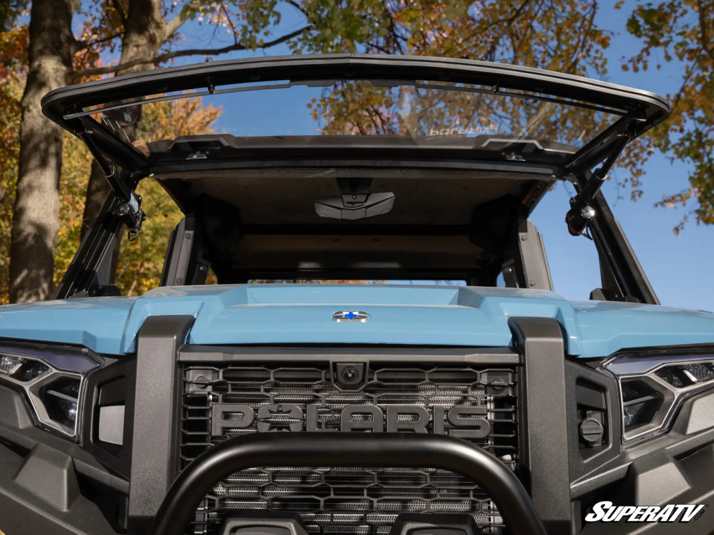 A SuperATV Flip Windshield installed on a Polaris Xpedition