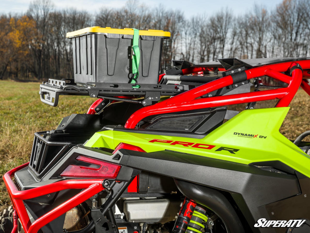 A RZR Pro R with a cargo rack and storage.
