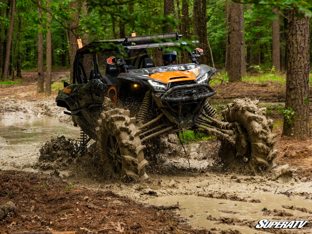 A utv big assassinator tires in a mud pit