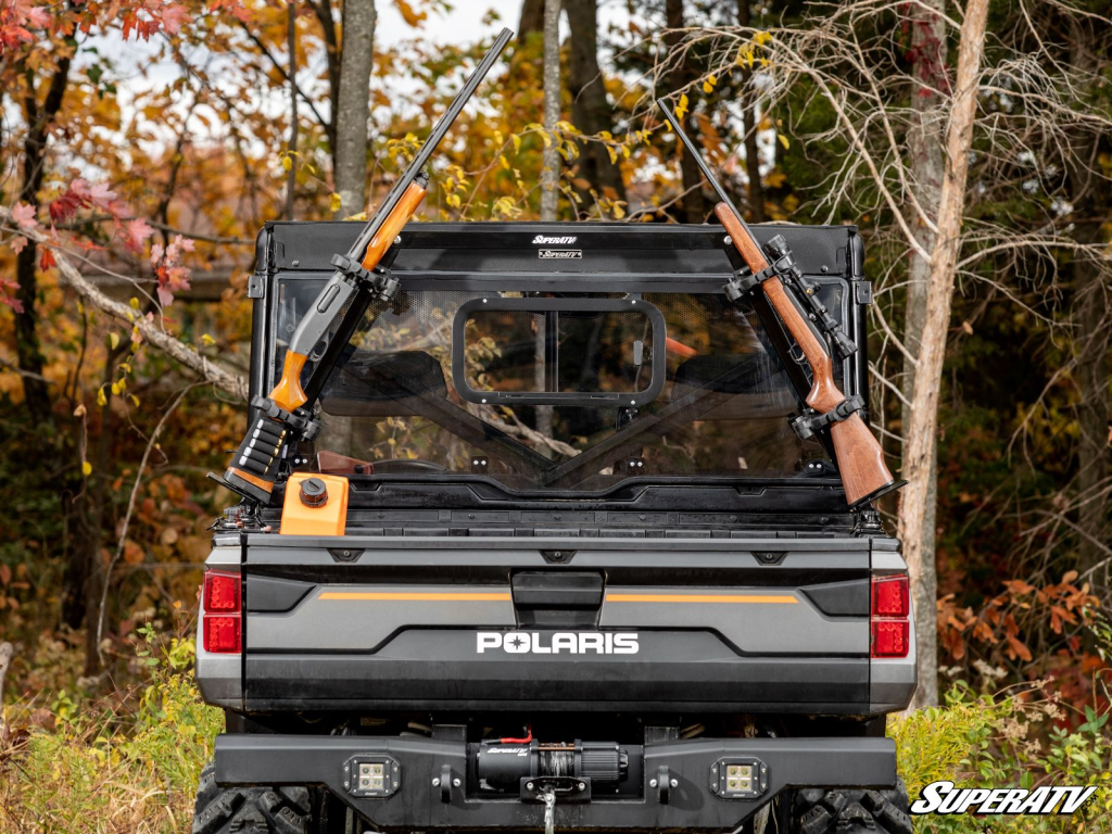 SuperATV's In-Bed Gun Rack installed on the rear of a Polaris Ranger.
