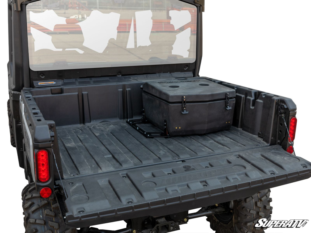 SuperATV's carbo box bolted down in the bed of a UTV.