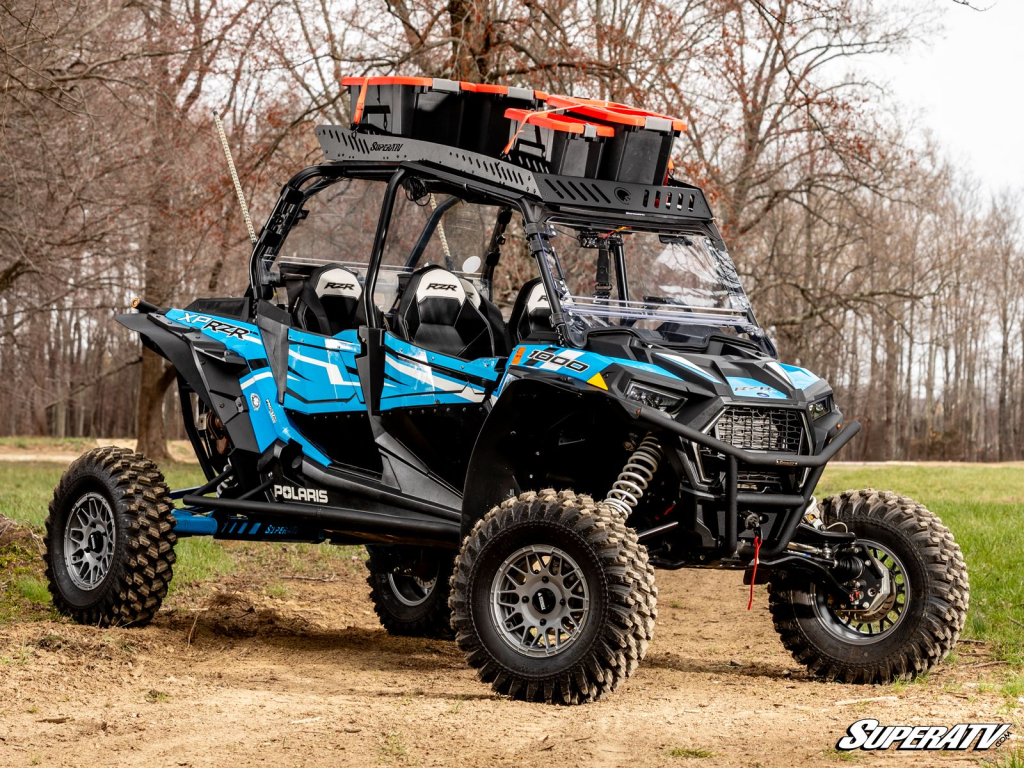 A Polaris RZR with a fully loaded roof rack from SuperATV.