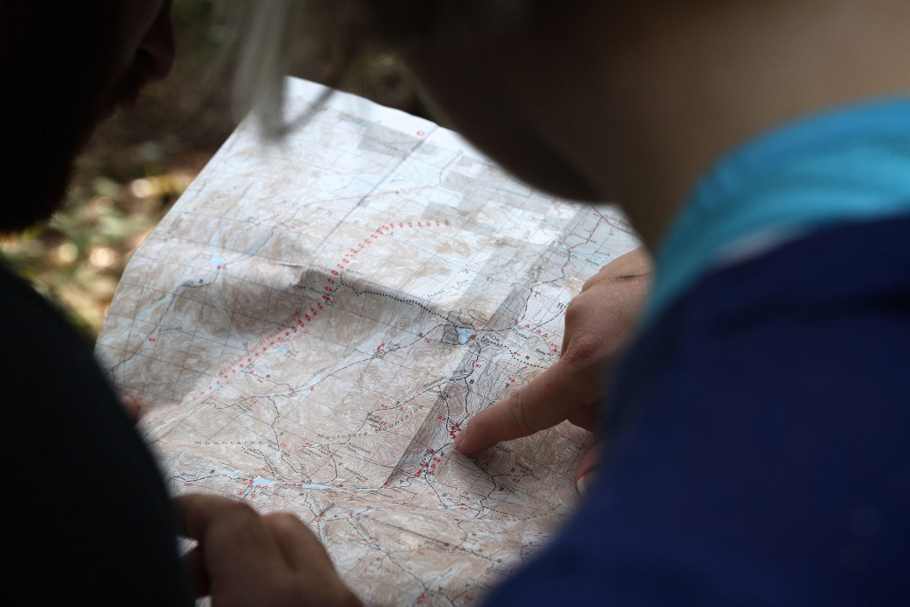 Riders using a map.