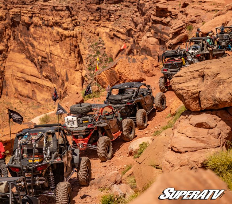A line of UTVs riding in Moab.