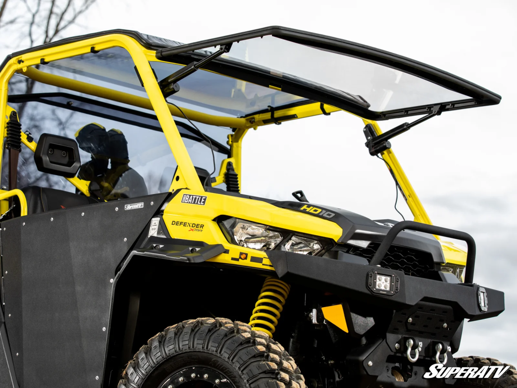 SuperATV MaxDrive Power Flip Windshield installed on a Can-Am Defender.