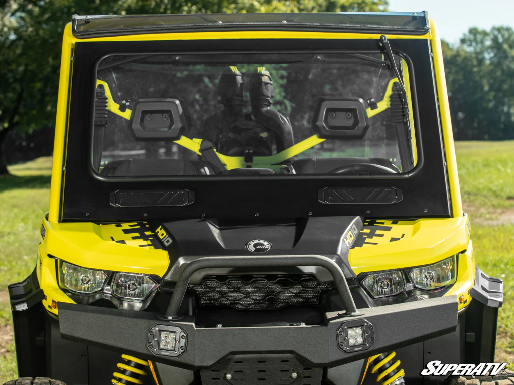 SuperATV Vented Glass Windshield installed on a Can-Am Defender.