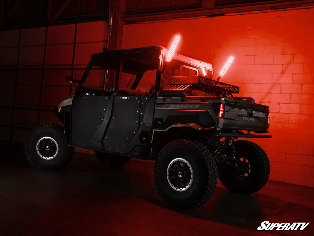 A Polaris Ranger with SuperATV Whip Lights installed on the rear.